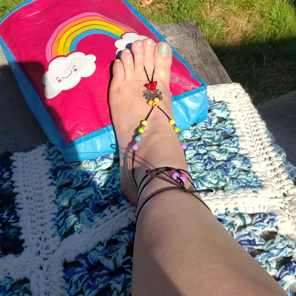 NWOT rainbow barefoot sandals